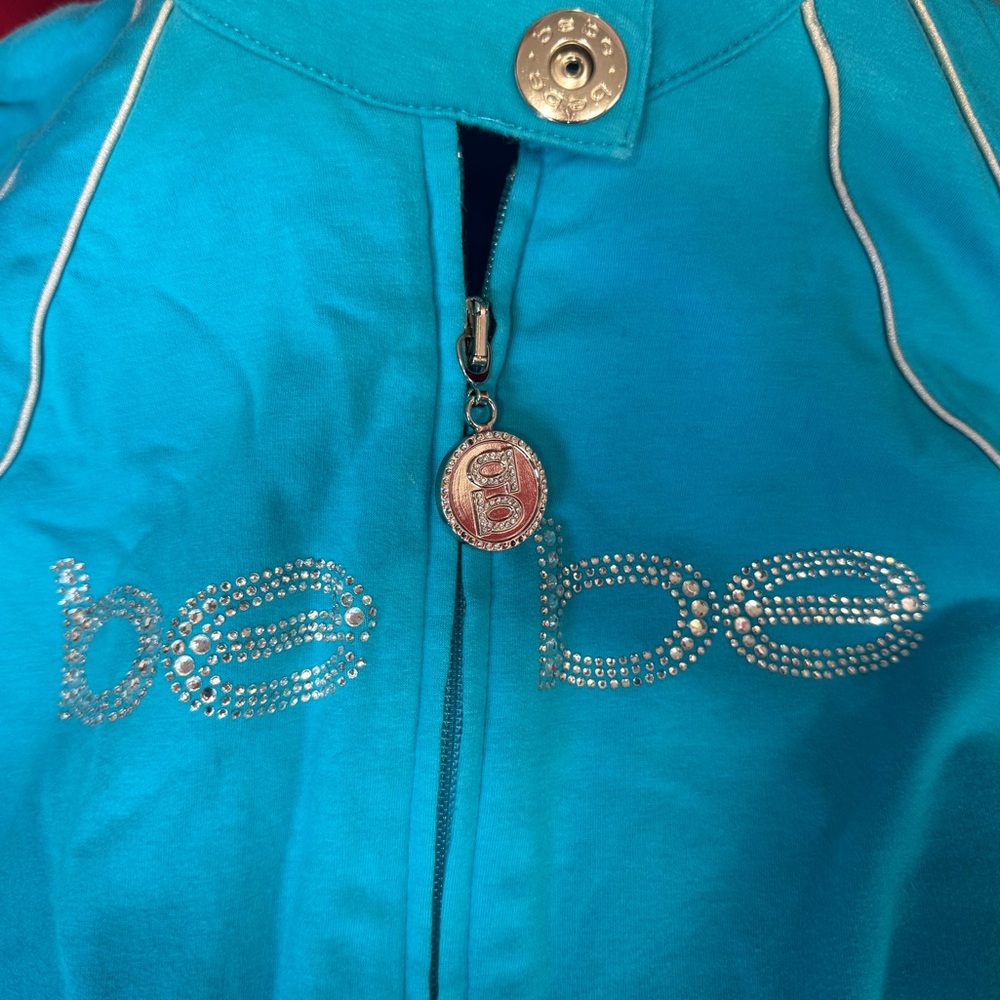 Bebe turquoise zip up jacket